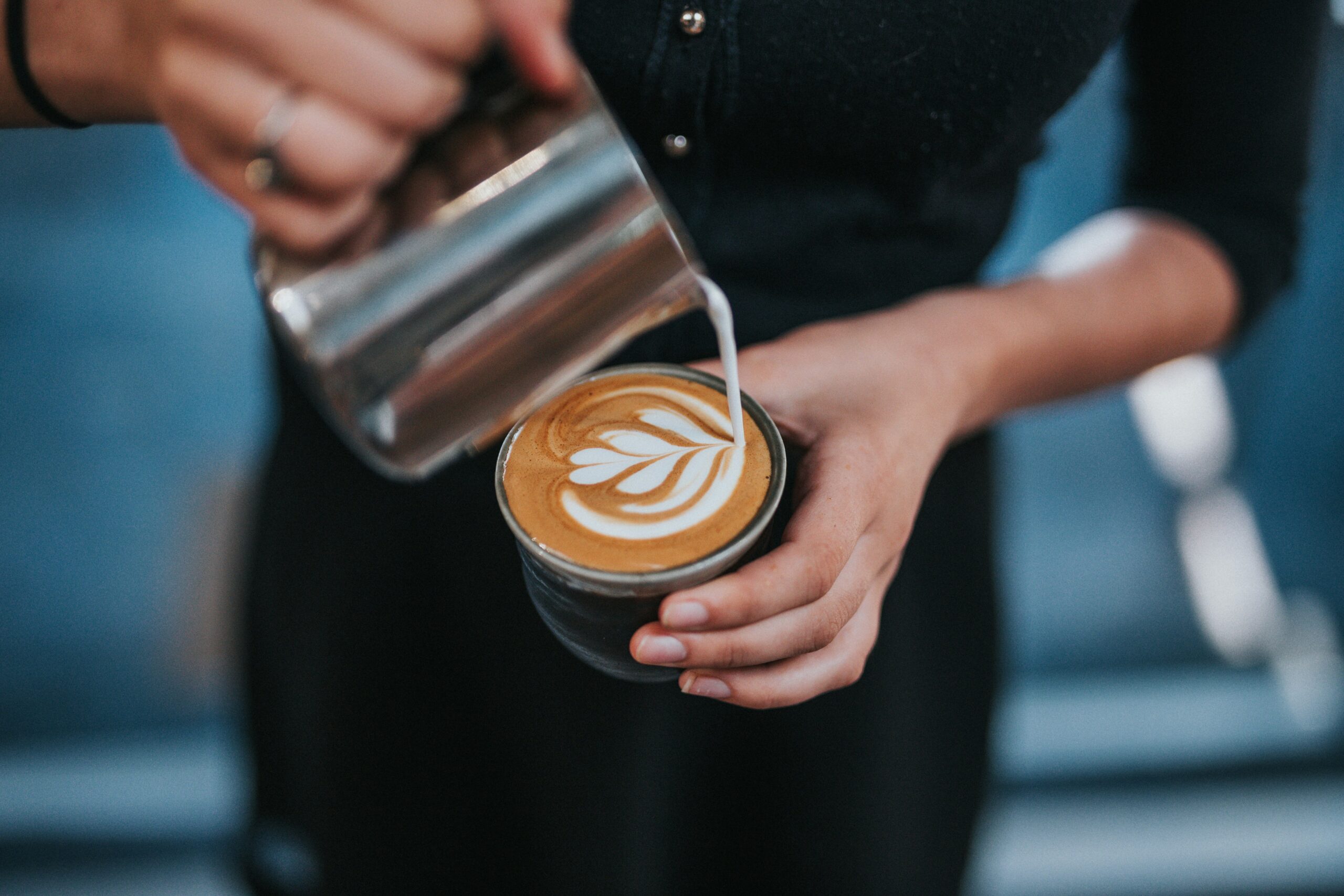 Sydney Barista Serving Coffee